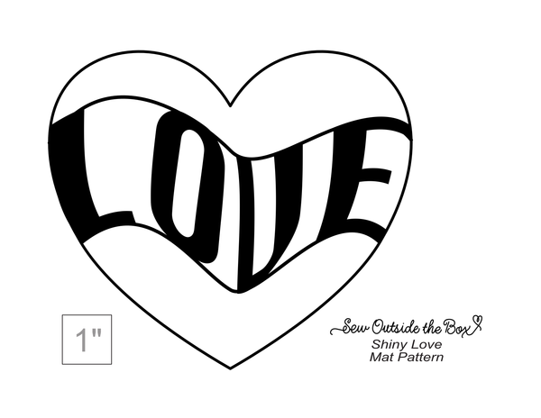 Photo of a pattern with a love graphic and heart line art for using with wool appliqué