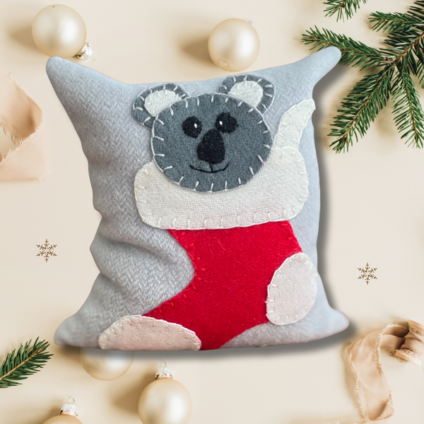 product photo of a wool appliqué cuddly koala pincushion