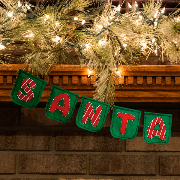 Close up of Santa Banner with Santa portion featured wool appliqué embroidery