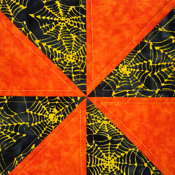 photo of quilt as you go pinwheel block